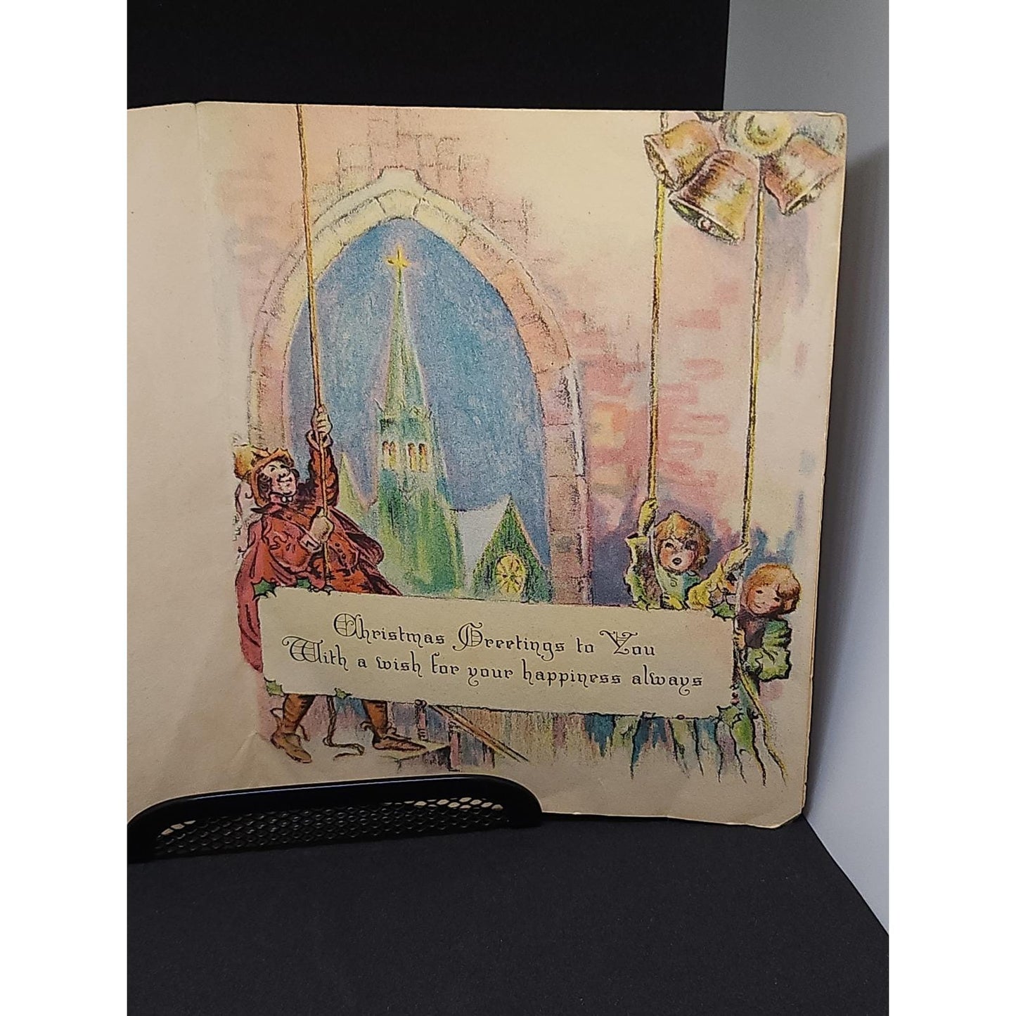 Vintage Merrie Christmas Greeting Card Hearth Scene Bell Ringers Illustration