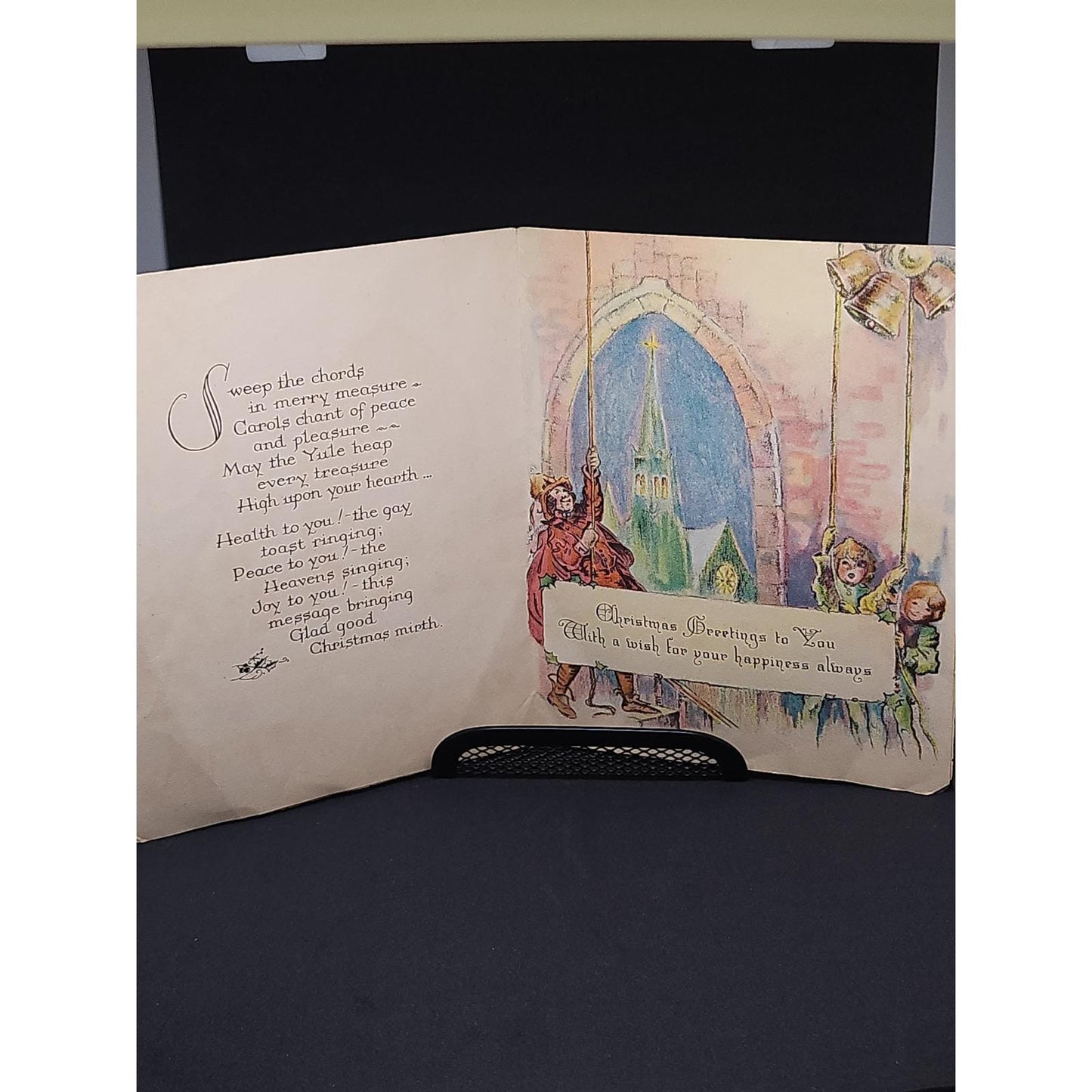 Vintage Merrie Christmas Greeting Card Hearth Scene Bell Ringers Illustration